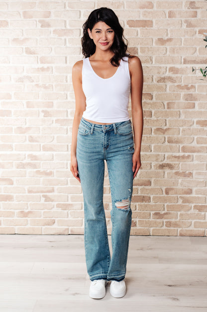 JUDY BLUE Mid Rise Distressed Released Hem Bootcut Jeans