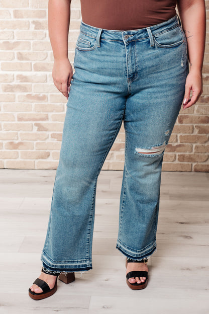 JUDY BLUE Mid Rise Distressed Released Hem Bootcut Jeans