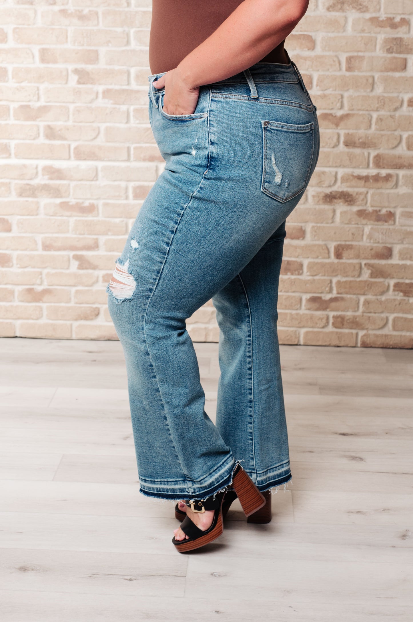 JUDY BLUE Mid Rise Distressed Released Hem Bootcut Jeans